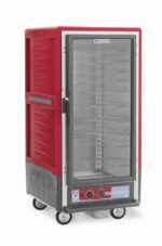 The Metro C537-HLFC-UA C5 3 Series 3/4 height insulated holding cabinet in red includes a full-length clear door, universal wire slides, interior tray racks, and four wheels. Its controls and temperature indicators are easily accessed on the lower front panel for convenience.
