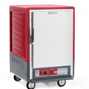 The Metro C535-HLFS-L C5 3 Series is a 1/2 height red insulated holding cabinet on wheels, with a full-length solid metal door and handle. It features digital controls and a bottom vent. Ideal for efficient food storage and transport, it operates at 120V, 60Hz in a robust yet compact design.