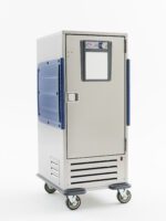 The Metro C5R9-SLA C5 R-Series Refrigerated Transport Cabinet is a metallic, rectangular cart on wheels with blue side handles. It features a 120V front door with a small window and temperature gauge, adjustable lip load slides, and bottom ventilation slots.