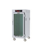 The Metro C587-SFC-LA C5 8 Series Insulated Reach-In Holding Cabinet, 3/4 Height, features a full-length clear door and Lip Load Aluminum Slides. It has digital controls at the top, operates on 120V and 60Hz, and is mounted on four caster wheels for easy mobility.