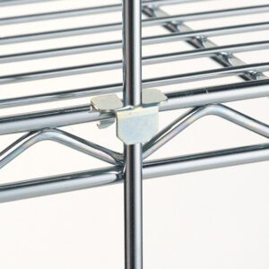 A close-up of a chrome metal shelving unit highlights the intersection of rods secured by Metro 9084Z Additional Plated Tabs for Super Erecta Wire Shelving, showcasing its sturdy design. The reflective shelves enhance its sleek, polished appearance.