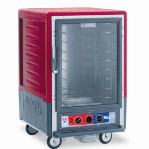 The Metro C535-MFC-4 C5 3 Series Cabinet is a stylish red unit with a full-length clear door, featuring fixed wire slides and multiple shelves. It includes a base control panel with dials and four wheels for easy movement.