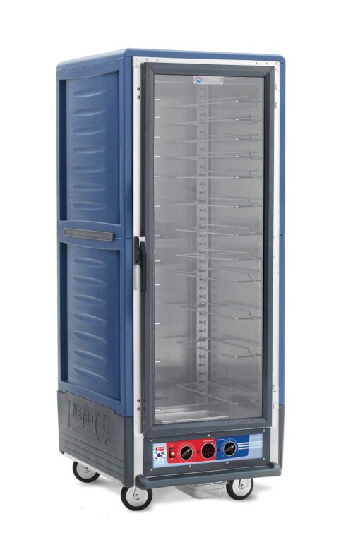 The Metro C539-MFC-U-BU C5 3 Series Cabinet, full-height with a clear door and blue finish, includes bottom control knobs, shelves, wheels for mobility, and universal wire slides. Its insulated moisture heated design at 120V ensures versatile food storage.