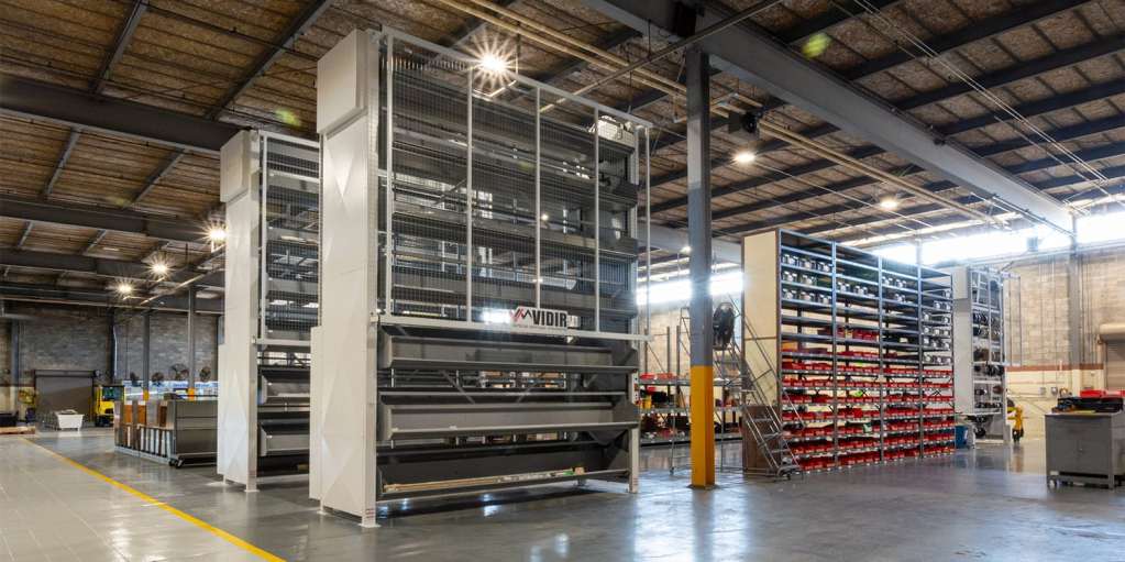 Row of Vidir vertical carousels installed in an industrial parts facility