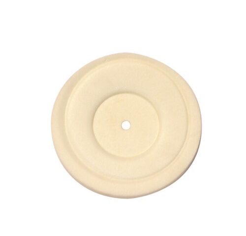 A round, flat beige disc resembling the Justrite Gasket F/Cvr Dispsl Can/Hplc with a small central hole and slightly raised border for a layered look. The material is smooth and matte.