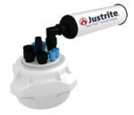 The Justrite Cap, model 83Mm with 4x1/8 and 3x1/4 ports plus a side filter, is a white VaporTrap Solvent Waste container featuring multiple top connectors and a cylindrical filter for capturing solvent vapors.