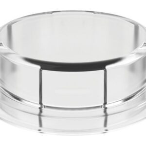 The Justrite Adapter is an 83mm clear plastic lid with a round design, flat top, and smooth edges. It features a recessed handle area for easy lifting and Closd design for a snug fit on matching containers.