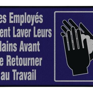 On a Justrite Mat, 194 Fren Employee Wash 3X5, a blue and black sign displays French text: Les Employés Doivent Laver Leurs Mains Avant de Retourner au Travail, with an icon of hands being washed.