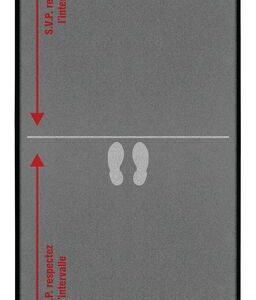 The Justrite Mat, 194 Fren Line Starts 4X12, features a gray surface with white text and graphics showing where a line begins. It includes white footprints, the phrase LA LIGNE DÉBUTE ICI, and red arrows with SVP respectez lintérieur pointing to the footprints.