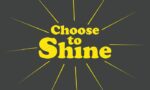Centered on a dark background, yellow text reading Choose to Shine is surrounded by radiating yellow lines, creating a sunburst effect similar to the Justrite Mat, 195 Choose To Shine 3X5 Ch.