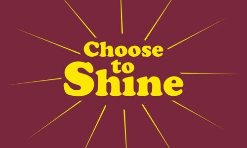 The image displays the 195 Choose To Shine 3X5 Rd. message in bold yellow text on maroon, with radiant yellow rays akin to a Justrite Mat, creating an uplifting effect.
