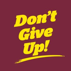 Maroon background with bold yellow text, Dont Give Up! and an accent line below, mimicking a vintage Justrite Mat, 195 DonT Give Up 3X5 Rd.