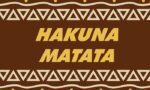 The image features Hakuna Matata in bold yellow on a rich brown Justrite Mat 195 design. An intricate pattern of triangles and lines surrounds the text, adding elegance to this joyful expression on the 3X5 mat.