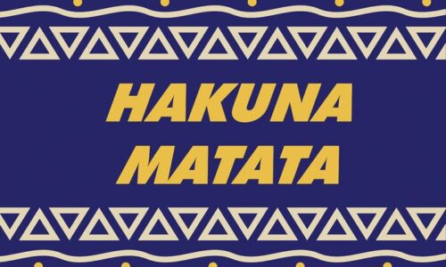 The image features bold yellow HAKUNA MATATA text on a dark blue background, mirroring the Justrite Mat, 195 Hakuna Matata 3X5 Bu design. Yellow triangles and dots decorate the borders with a vibrant pattern.