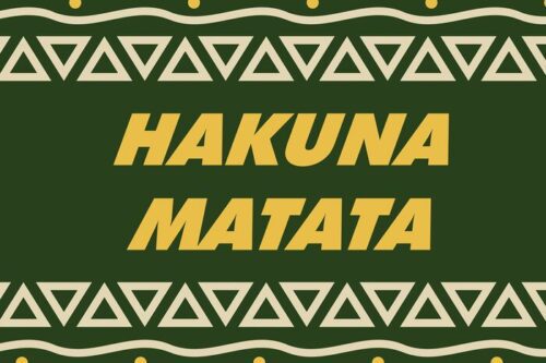 The image shows Hakuna Matata in bold yellow letters on a dark green background, bordered by geometric triangles and circular dots in light beige, reminiscent of the Justrite Mat,195 Hakuna Matata 4X6 Gn style.
