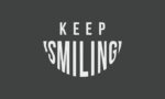 On a dark background, KEEP SMILING appears with SMILING forming an upward curve like a smile, mirroring the uplifting charm of our Justrite Mat, 195 Keep Smiling 3X5 Ch, designed to brighten any space.