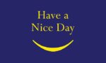 On the Justrite Mat, Have a Nice Day in yellow text on a dark blue background with a yellow curved line evokes warmth and welcome.