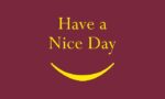 The Justrite Mat, 195 Have A Nice Day 3X5 Rd features text reading Have a Nice Day above a curved yellow line as a smile on a maroon background.