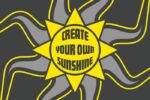 The Justrite Mat, 195 Create Sunshine 4X6 Ch design features a yellow sun with wavy rays on a dark background and bold retro-style text Create Your Own Sunshine, bringing warmth and inspiration to any space.