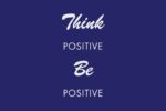 The Justrite Mat,195 Think Be Postve features white text on a dark blue background reading Think Positive Be Positive, with Think and Be in script font and Positive in sans-serif.