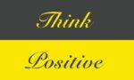 The image displays Think Positive in elegant cursive with Think in yellow on dark gray and Positive in gray on bright yellow, similar to the motivational design of Justrite Mat,195 Think Positive 3X5 Ch.