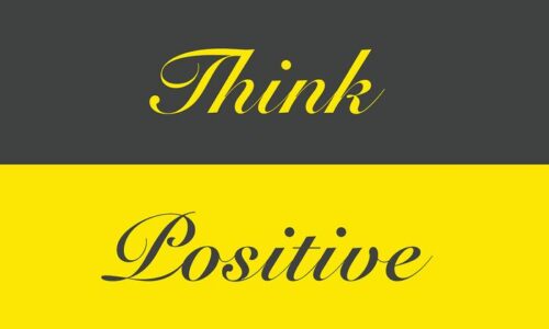 The image displays Think Positive in elegant cursive with Think in yellow on dark gray and Positive in gray on bright yellow, similar to the motivational design of Justrite Mat,195 Think Positive 3X5 Ch.
