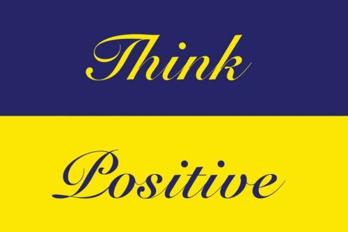 The image features the Justrite Mat,195 Think Positive 4X6 Bu design with Think in yellow on a blue background and Positive in blue on yellow, both in elegant cursive. This mat exudes optimism, making it ideal for brightening any space.