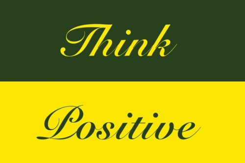 The image showcases the Justrite Mat,195 Think Positive 4X6 Gn with Think Positive in cursive. Think is highlighted in yellow on a dark green background, and Positive contrasts beautifully in dark green on a vibrant yellow background.