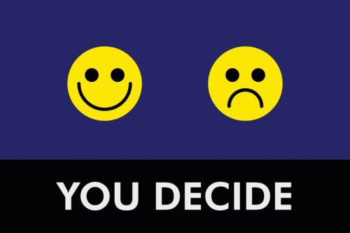 Two yellow emoticons on a dark blue backdrop: a smiling one on the left and a frowning one on the right. Below them, white text reads YOU DECIDE on a black Justrite Mat,195 You Decide 4X6 Bu.