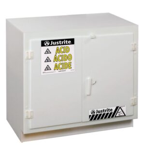 The Justrite Cabinet, Acid, Poly, U/C, Wht is designed for acid storage with durable Poly construction. It has warning labels in English, Spanish, and French with a safety symbol. The design includes two doors and a simple handle for optimal protection.