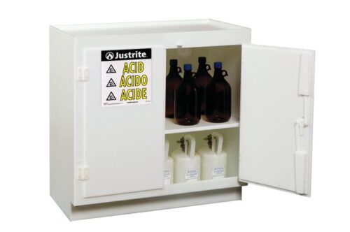 24015.jpg The Justrite Cabinet Acd, Poly Standing, Wh is opened, showcasing shelves with brown bottles and white containers. A label on the door reads Justrite Acid Ácido Acide with warning symbols for safe hazardous material storage.