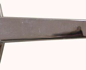 The Justrite L Handle Only, showcased against a plain backdrop, features a sleek design with an integrated lock. A keyhole on the left side enhances its functional elegance.