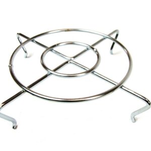 This metal trivet, similar to the Justrite Grill Guard, F/Cf Head 26265L, boasts a circular design with four sturdy legs and intersecting lines connecting its inner and outer circles for dependable support of hot cookware.