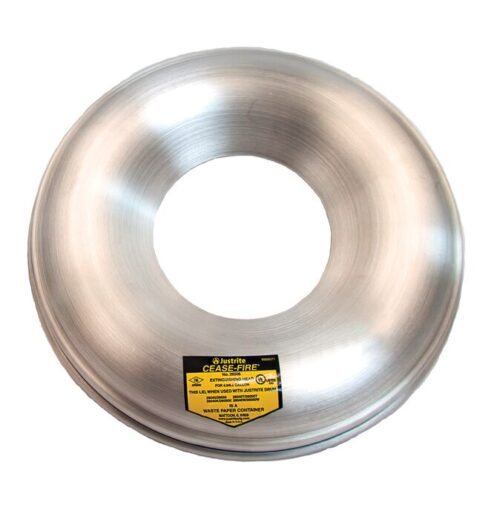 A reflective round metallic lid with a central hole, designed for the Justrite Head Alum Cf, F/4.5-6G Drum, features a yellow label with text and symbols on the lower section, providing an ideal fit for securing your drum.