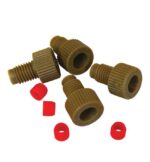 On a white surface, three brown plastic threaded caps with ribbed edges and hollow centers are neatly arranged, accompanied by four small red rubber O-rings and a Justrite Fitting F/Tube 1/8Od, Set/4.