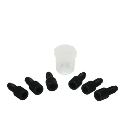 A Justrite Plug Cap Kit, Manifold, Poly with six black threaded nozzle tips surrounds a clear plastic container, forming a semicircle on a white background.