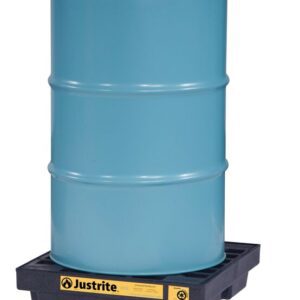 A blue metal drum rests on a Justrite Accum Ctr, 1 Drum, Ecopoly Blk spill containment pallet with a yellow label.
