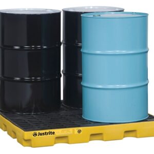 Three black and one light blue industrial drums sit on a yellow Justrite Accum Ctr, 4 Drum, Ecopoly Yel spill containment pallet, designed to prevent leaks and spills while ensuring safety in industrial environments.