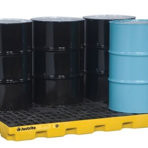 Four metal barrels—three black and one blue—are neatly arranged on a Justrite Accum Ctr, 6 Drum, Ecopoly Yel spill containment pallet against a pristine white background, highlighting the striking contrast.