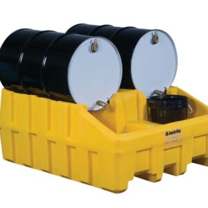 Two black barrels with white tops are stored on a yellow Justrite Drum Mgmt Base, Ecopoly. A smaller black container is placed in front of the barrels.