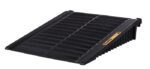 The Justrite Ramp, F/2-4 Drmshed, Eco Blk is a black rubber ramp from Matting Technologies with a textured surface for traction. It has a slightly inclined design for small steps or thresholds and raised edges for safety. A label is also featured on the side.