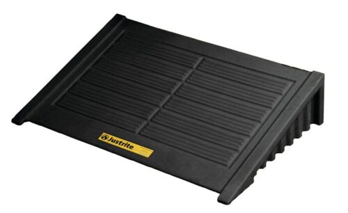 The Justrite Ramp is a black, rectangular wedge-shaped pad with a textured surface and a yellow brand label. Designed for 4 Drum Sq setups, its made from durable Ecopoly material.