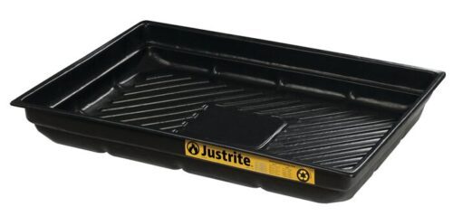 The Justrite Tray, Spill 48X23, Ecopoly, Bk is a black rectangular tray with a ridged surface and slightly raised edges. The front showcases the Justrite brand name in yellow and black.