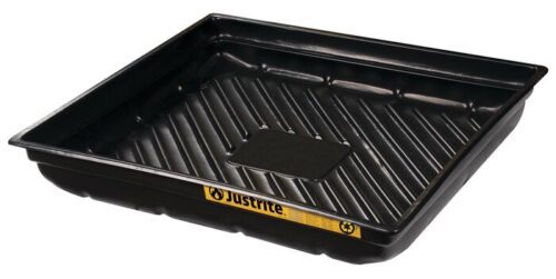 The Justrite Tray, Spill 38X34 Ecopoly in black features ribbed grooves, slightly raised edges, and a distinctive yellow label on one side for spill containment.
