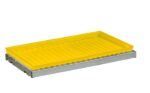 The yellow rectangular tray with a ridged surface on a sturdy gray metal base resembles the Justrite Shelf Splslp/Tray 12/15 22Gslm, ideal for organizing items. The flat base elevates the tray slightly, ensuring both stability and style.