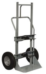 The Justrite Gcyl Ht,1Cyl,Fft gray metal hand truck features two large black rubber wheels, a sturdy handle, and a flat base. Its perfect for safely transporting items with an adjustable clamping mechanism on the vertical support.