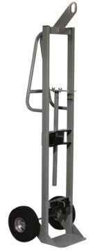 An image showcases a vertical Justrite Gcyl Ht hand truck with two wheels and a looped handle, perfect for maneuvering. It features a flat base designed to carry objects efficiently.