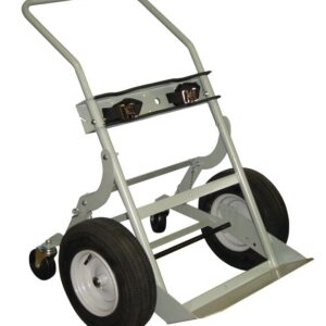 The Justrite Gcyl Ht,2Cyl,4W,Fpt,16 hand truck features a sturdy metal frame, large rubber wheels, and a flat base for carrying items. It includes handles for easy maneuvering and small pivoting wheels at the back for added support and stability.