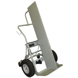 The Justrite Gcyl Ht,2Cyl,Fw,4W,Fpt,16 is a gray hand truck ideal for moving heavy objects. It features sturdy handles with chains for securing and rests on a flat metal base with two large rubber wheels and a tall vertical back for easy loading.