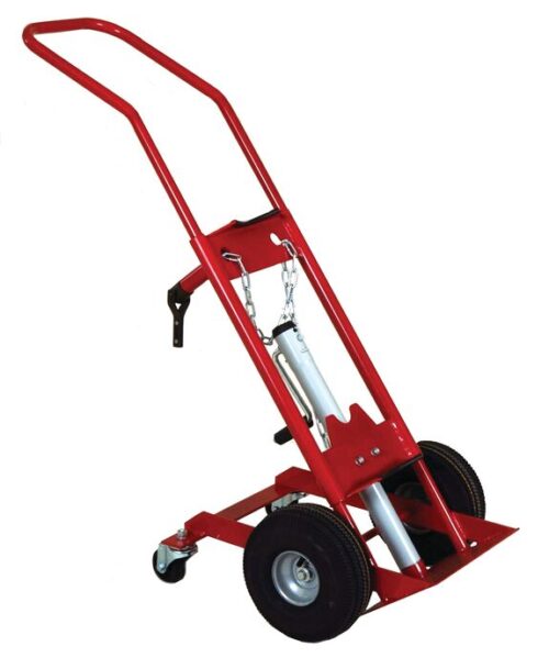 The Justrite Gcyl Ht, 1Cyl, Cyl Caddy is a red hand truck with two large black wheels and a handle. It has a metal frame with an added small caster wheel for stability and comes with chains attached to the central frame to secure loads securely.
